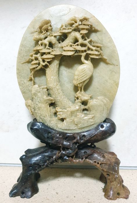 Ancient Asian carved plaque with soapstone base