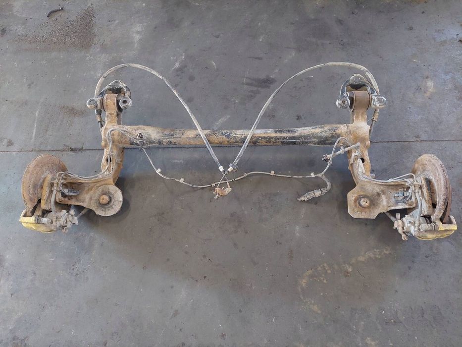 BELKA OŚ ZAWIESZENIA TYŁ OPEL ASTRA H HB 5D