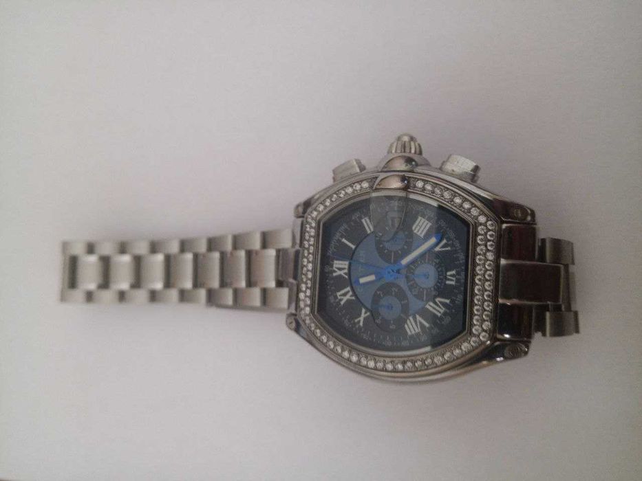 годиник  cartier roadster