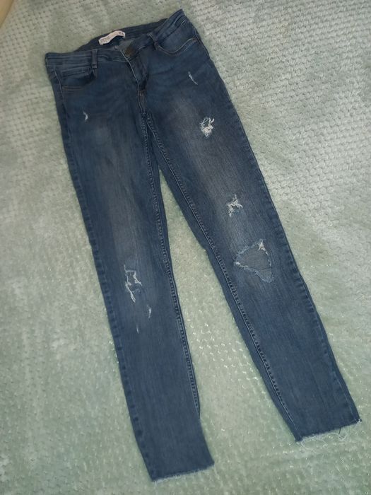 Damskie spodnie jeansowe