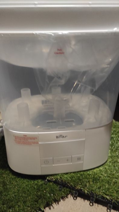 Паровий стерилізатор та сушарка дитячих пляшок