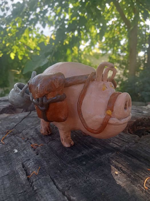 Escultura Porco Viajante