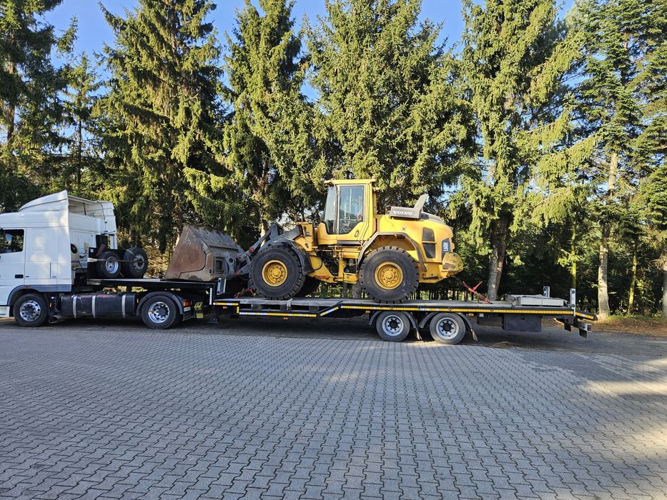 Transport maszyn rolniczych, budowlanych, pomoc drogowa, laweta.