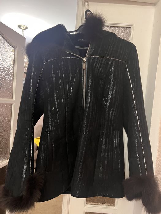 Тепла дубленка жіноча