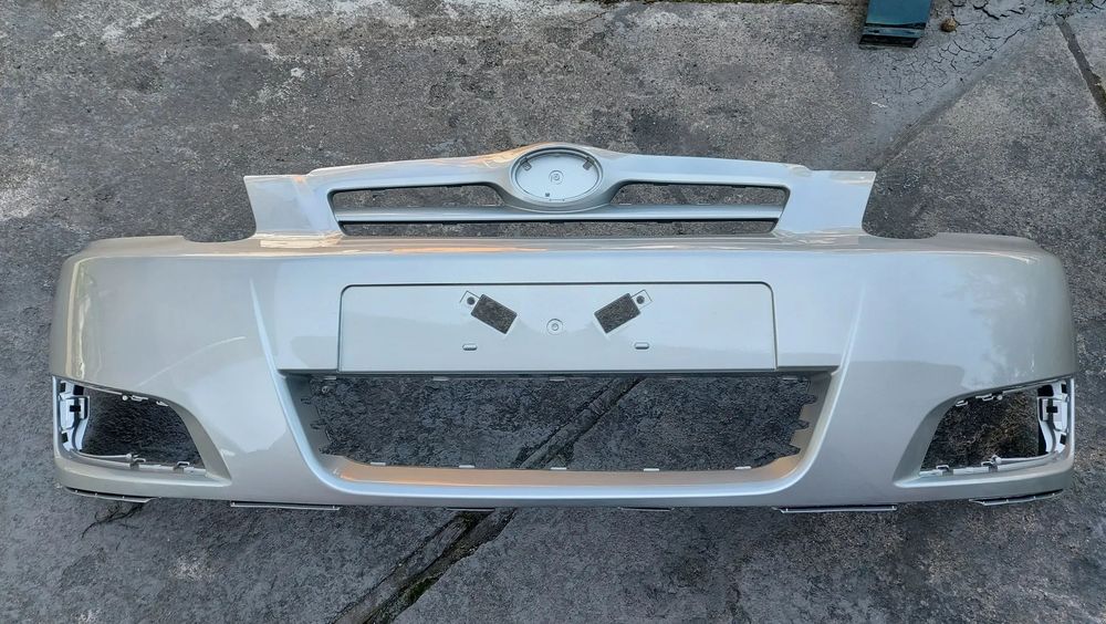 Toyota Corolla E12 04-07 LIFT zderzak przedni hatchback  kod lakieru 1C0