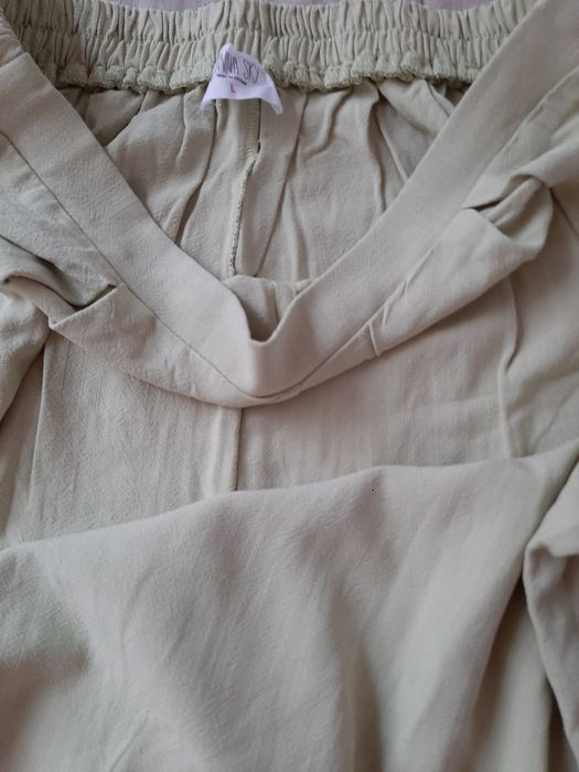 Nowe spodnie pistacjowe L skład Rayon i lenn