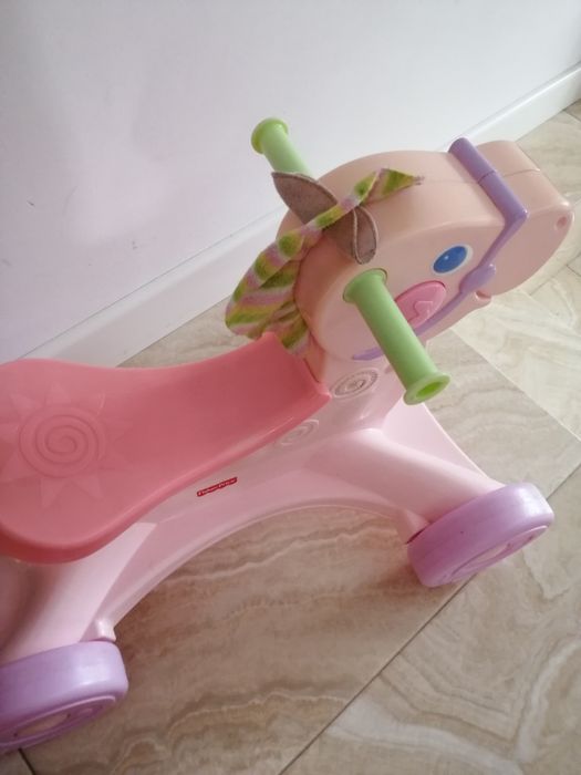 Konik jeździk pchacz Fisher Price