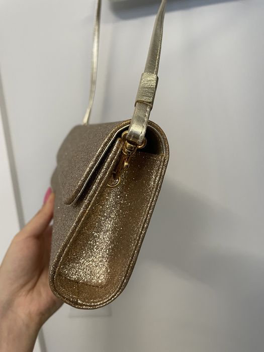 Zlota kopertówka Russell & Bromley