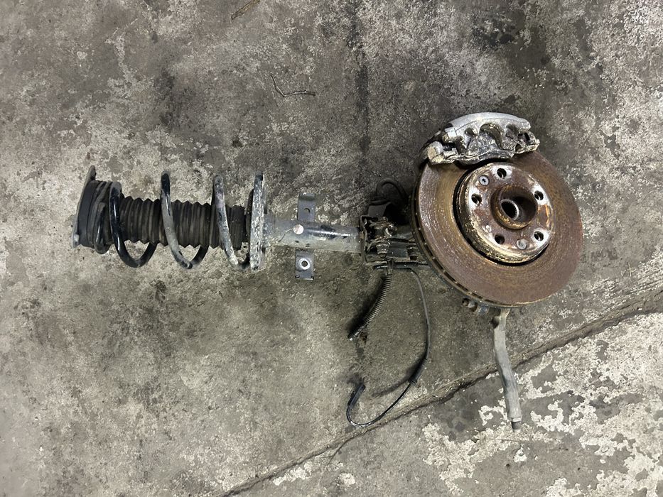 Mcpherson prawy sprężyna zwrotnica prawa Renault Zoe II