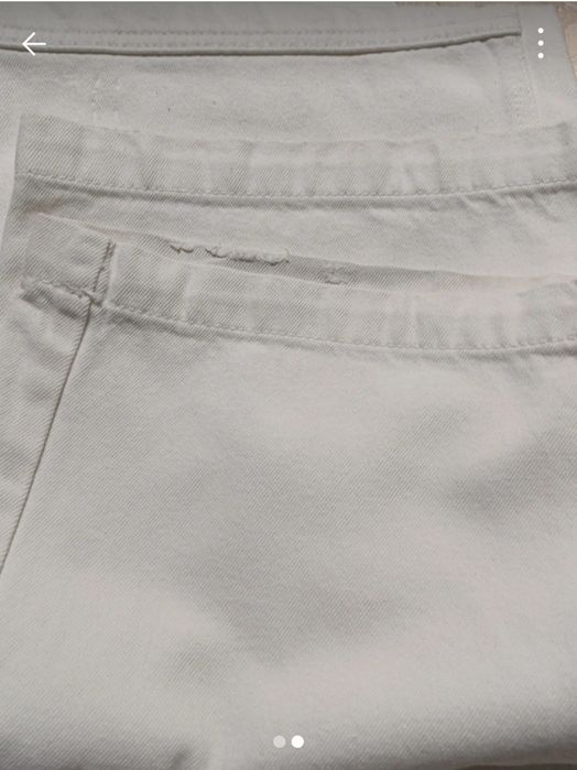 Calças ganga com bolsos de lado