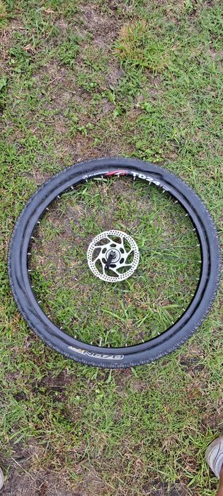 Koło rowerowe z hamulcem tarczowym