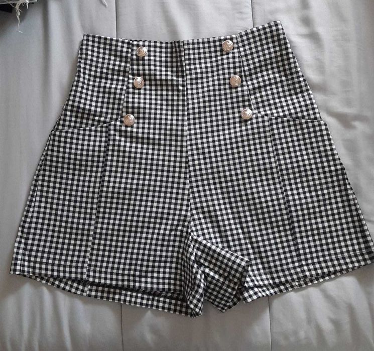 Calções xadrez- pouco usados