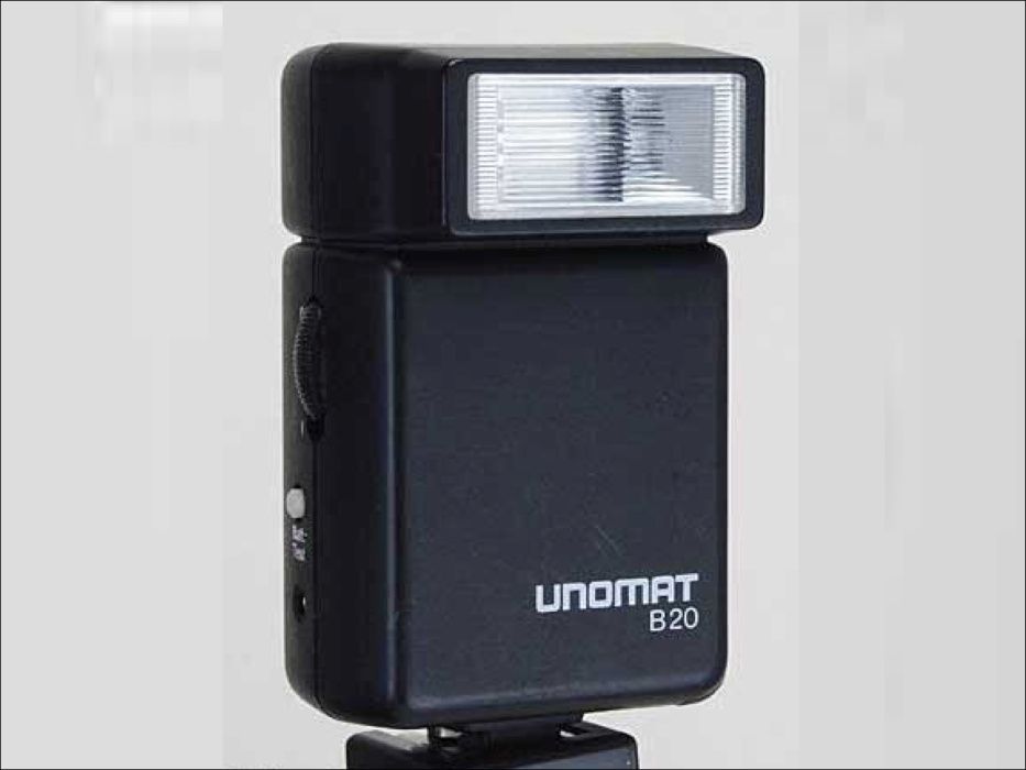 Flash / Iluminador UNOMAT B20 fixação universal p/máquina fotográfica.64584258835586120