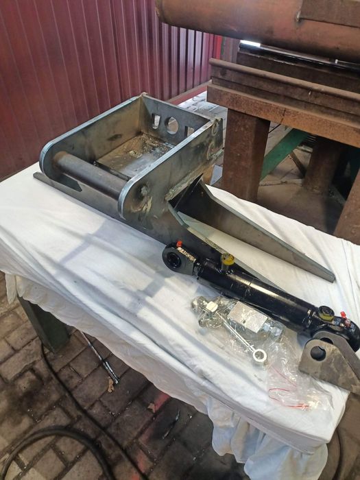 Mocowanie hydrauliczne do łyżek skarpowych