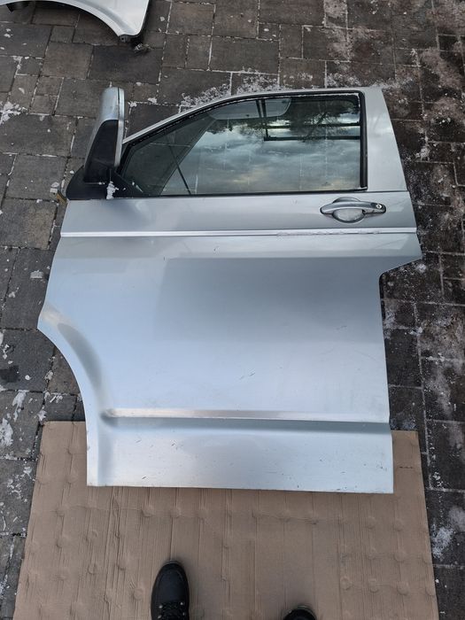 Vw transporter t5 drzwi przednie lewe lewy przod srebrne la7w