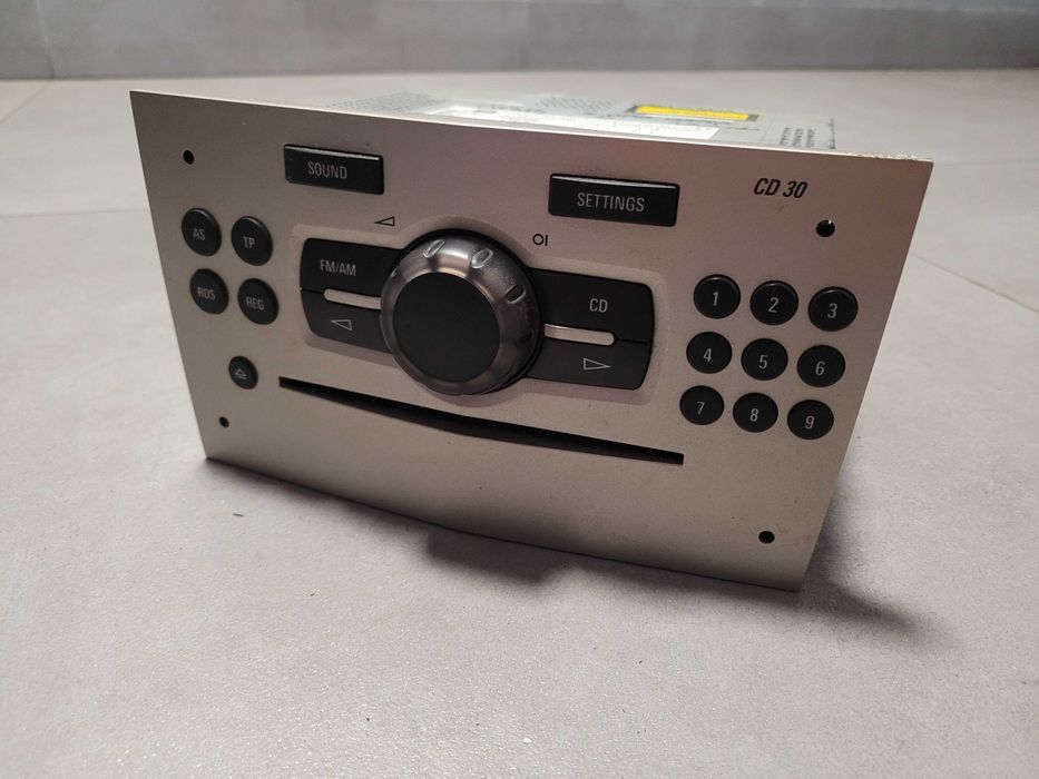 Radio samochodowe fabryczne Opel Corsa D 497.316.088 złote srebrne