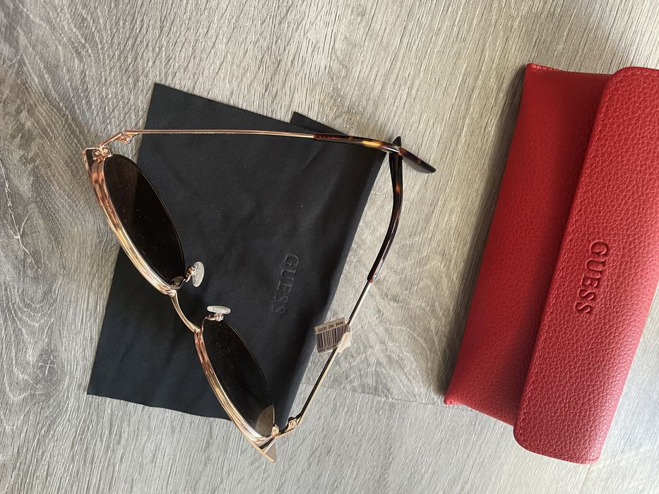 Guess óculos de sol, olho de gato dourados