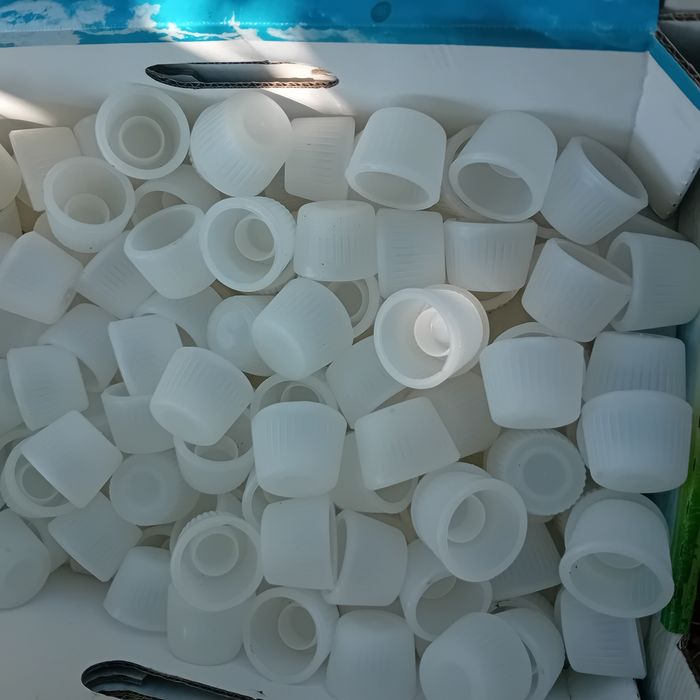 Capsulas para garrafoes, etc