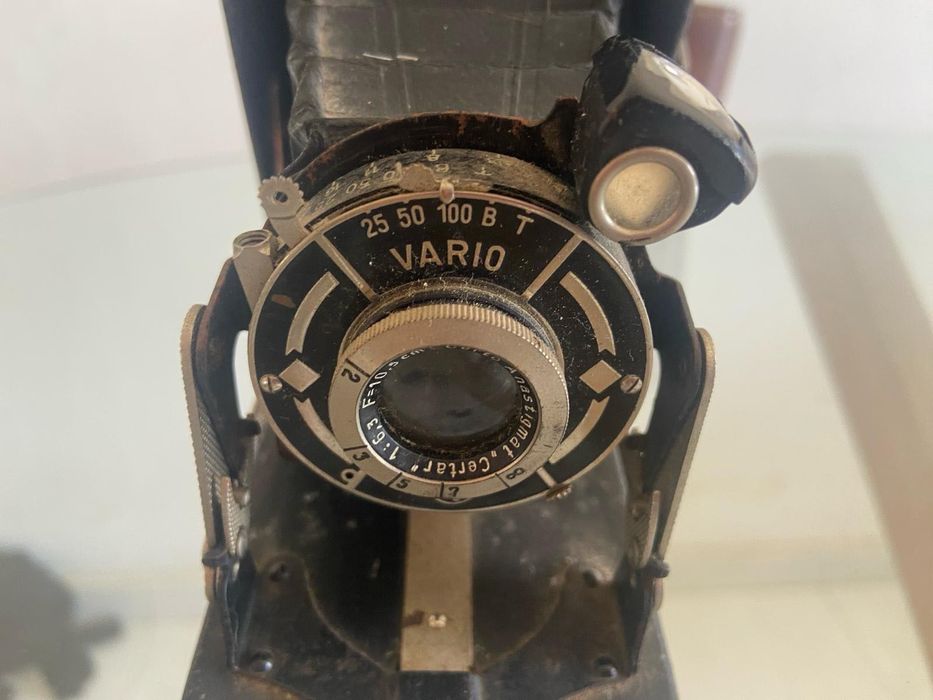 Máquina fotográfica antiga429044519068641281
