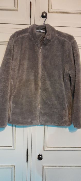 Casaco de pelo com bolsos novo