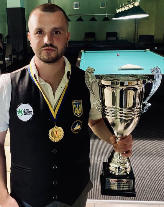 Тренер з Більярду