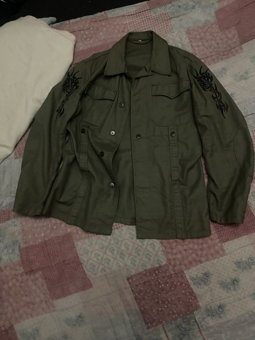 casaco verde com cybertribal