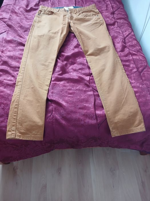 Джинси коричневого кольору