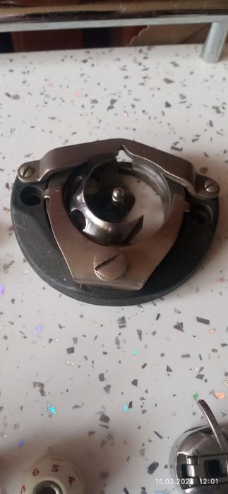 Запчасти швейной машинки.