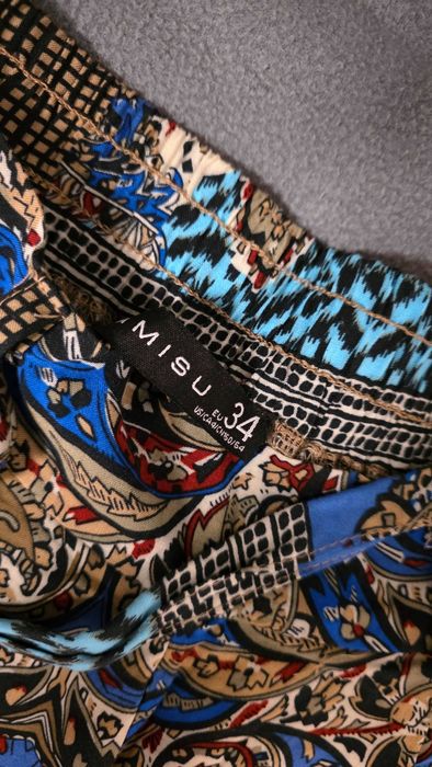 Spodnie z wysokim stanem, szeroka nogawka 34 - wzory