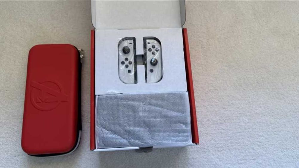 Nintendo Switch OLED w świetnym stanie na gwarancji brak gier