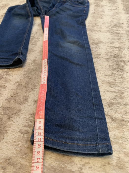 Cienkie elastyczne jeansy slim fit dla chłopca Lupilu rozmiar 128
