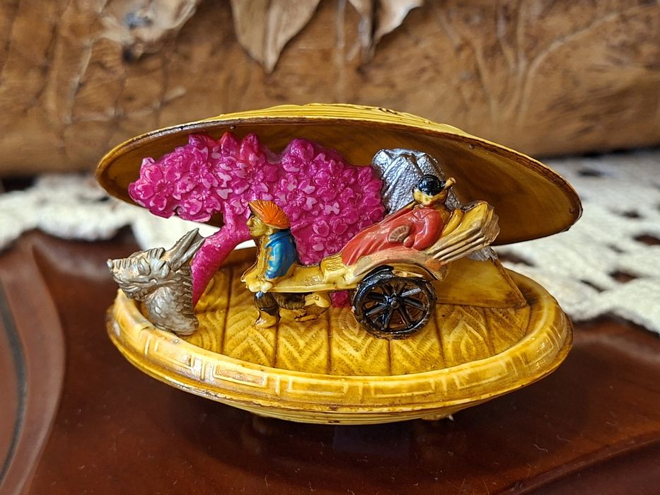 Miniatura antiga de carregador Japonês em celuloide