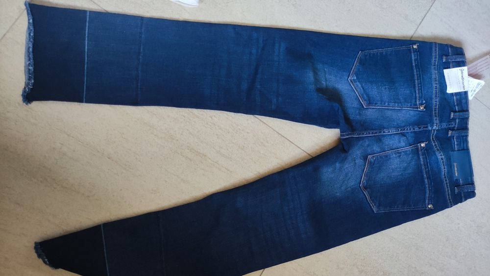 Spodnie jeansy Stradivarius 36