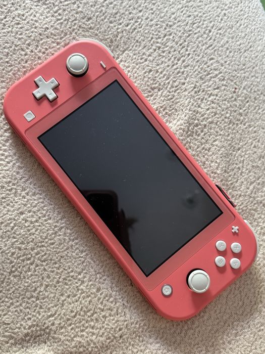 Nintendo Switch Lite Rosa (Como Nova) + 2 Jogos (Mario + Crash) + Capa