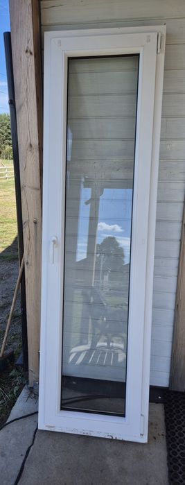 Białe okno 60x210 + moskitiera