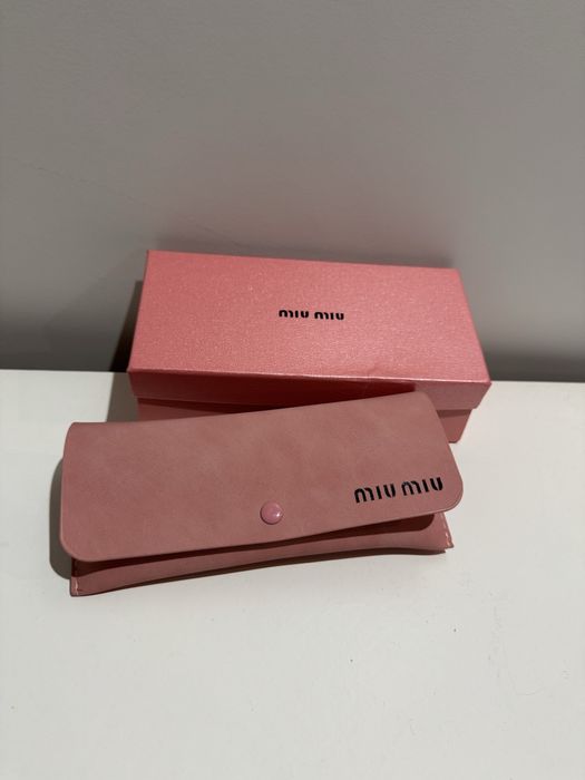 Oculos de sol (miu-miu)