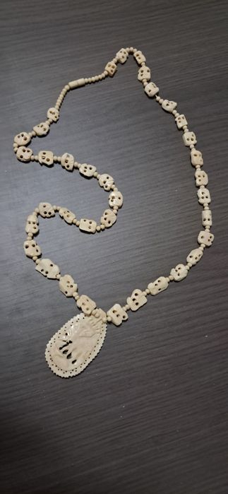 Colar de elefante esculpido em osso bovino vintage