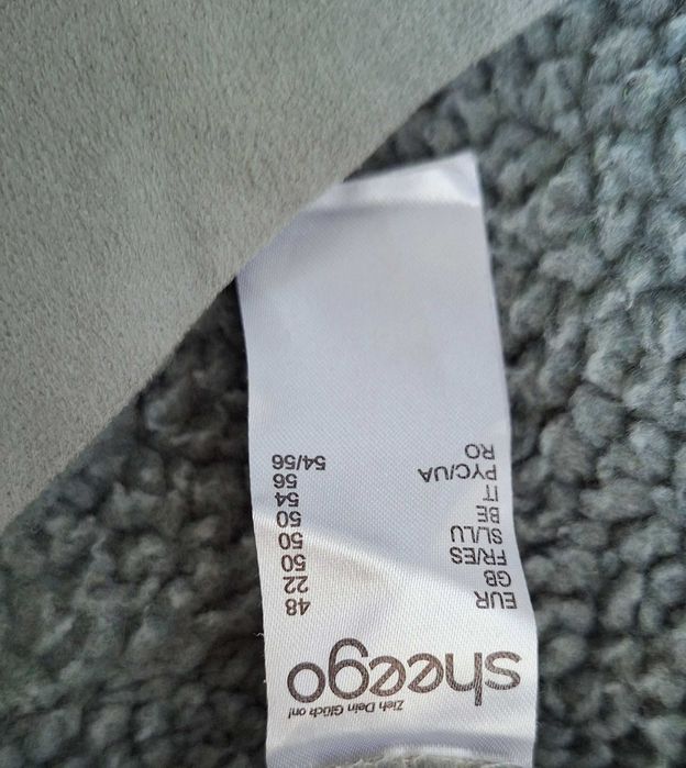Miętowy płaszcz zimowy kożuch Sheego