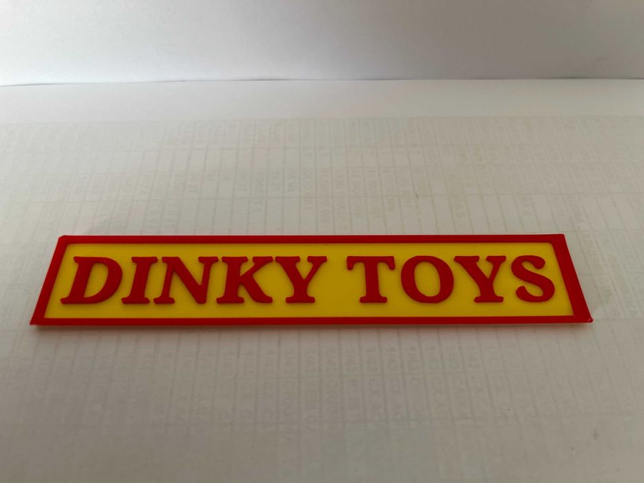 Sinal DINKY TOYS liso , para expositor de miniaturas, ver exemplo