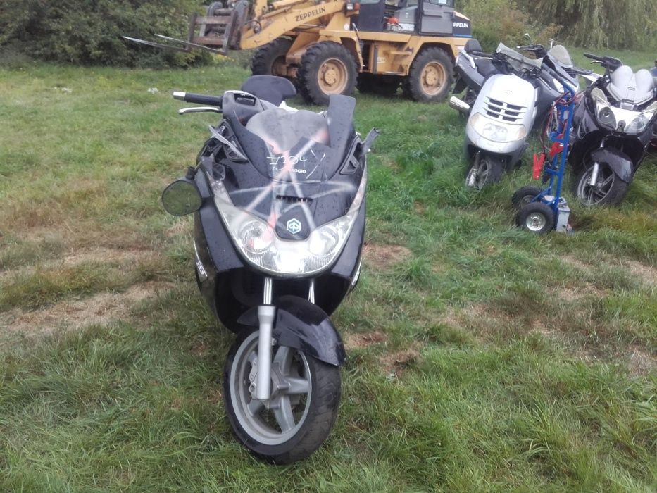 Piaggio x8 x 8 silnik lagi owiewka lampa koło felga tarcza części