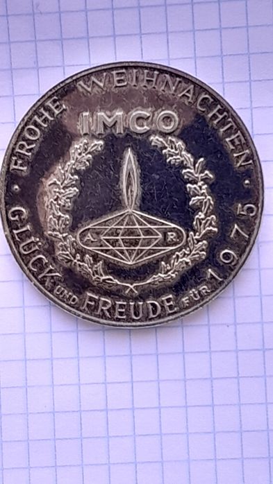 Оригінальна австрійська срібна медаль компанії IMCO.