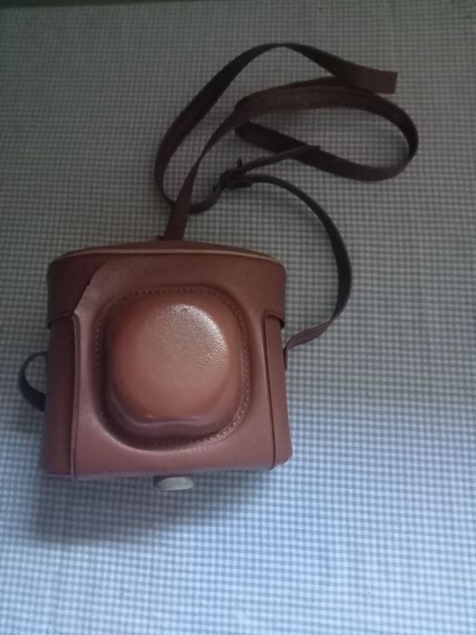 Máquina vintage com bolsa