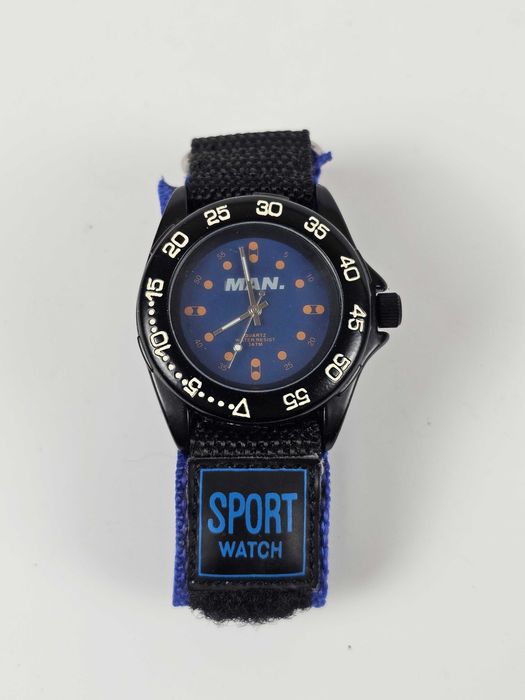 MAN. – sportowy zegarek kwarcowy, bezel, pasek na rzep