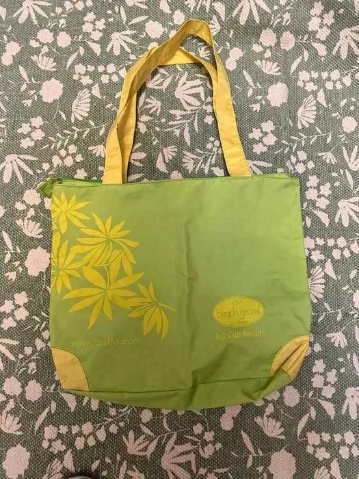 Mala praia vintage impermeável Anita verde e amarela