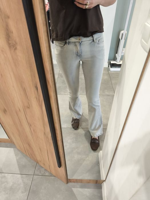 Jeansy s  pas 70cm długość całkowita 102cm