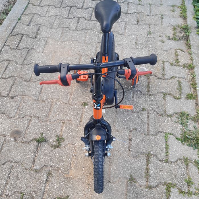 Bicicleta de criança de 14 polegadas em estado novo.