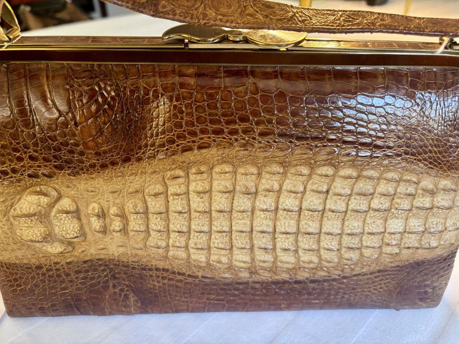 Mala em pele de crocodilo verdadeira
