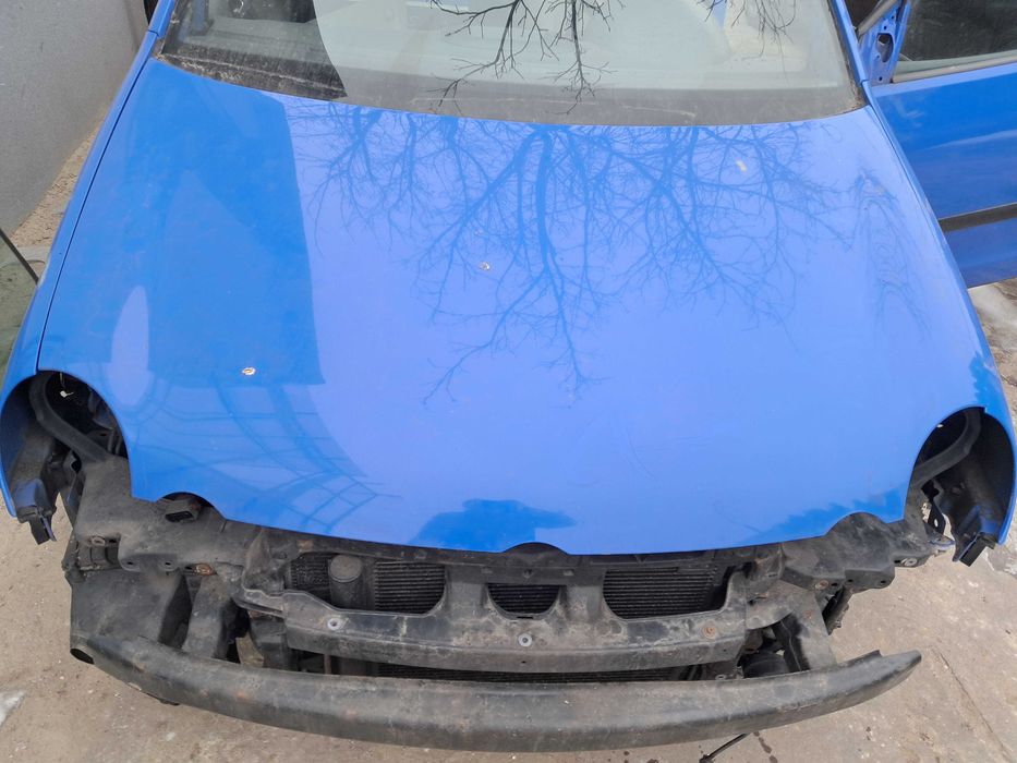 Zderzak maska przód vw polo okular niebieski