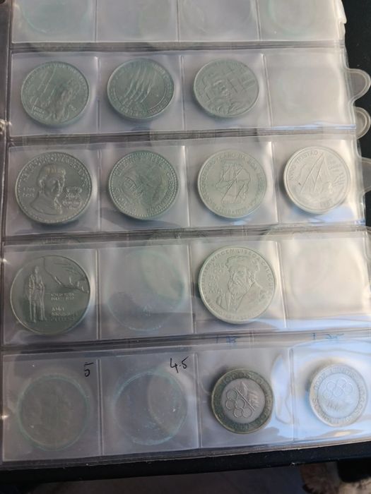 570 moedas diversas,1 álbum e 28 folhas