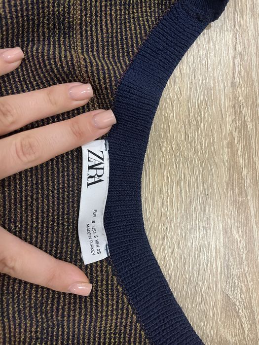 Топ фірма  Zara